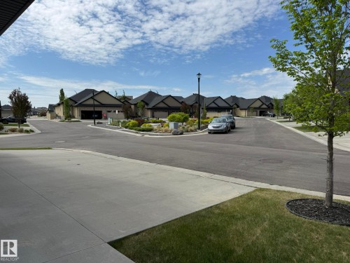Paved streets with concrete sidewalks and streetlights - 2 104 Allard Link, Edmonton, AB 