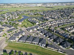 Aerial perspective showcasing a residential community with diverse housing styles - 