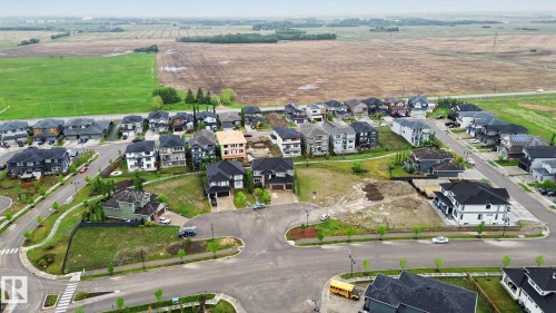 Aerial perspective of a developing residential neighborhood with varied architectural styles - 3036 59 Avenue, Rural Leduc County, AB 