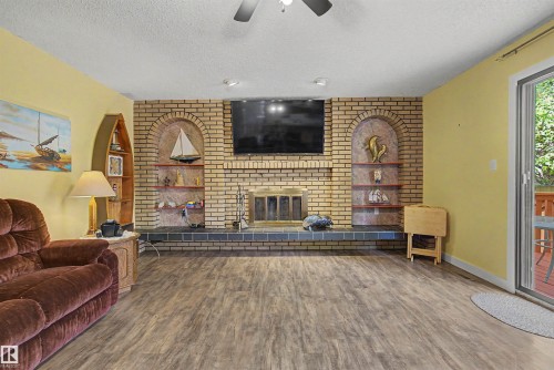 2068 45 Street, Edmonton, AB - Indoor Photo Showing Living Room With Fireplace