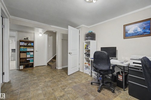 Finished lower level space featuring tile flooring and painted walls - 2068 45 Street, Edmonton, AB - Indoor Photo Showing Office