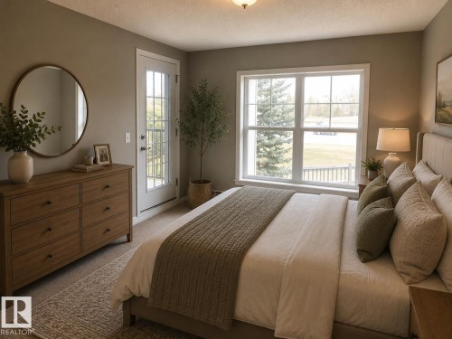 Bedroom featuring soft neutral wall color, carpet flooring, and a large window with white trim - #206 616 Mcallister Lo Sw, Edmonton, AB - Indoor Photo Showing Bedroom