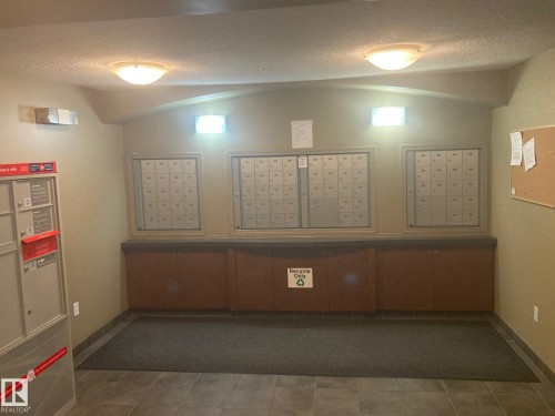 Centralized mailboxes with integrated parcel delivery system - #206 616 Mcallister Lo Sw, Edmonton, AB - Indoor
