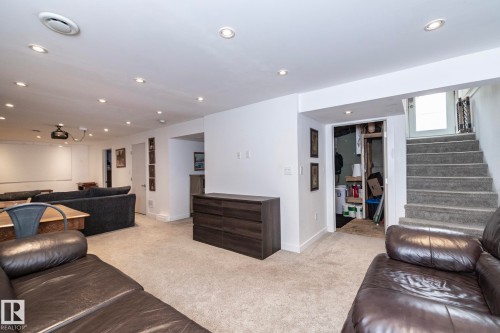 Carpeted recreation room with recessed lighting - 7719 86 Avenue, Edmonton, AB 