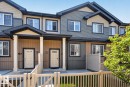 Multi-toned exterior featuring horizontal siding and shingle accents - 62 3305 Orchards Link, Edmonton, AB 