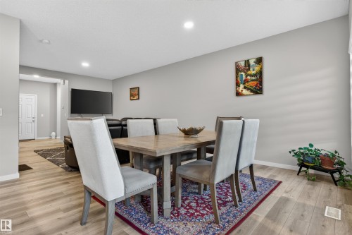 Dining area featuring wood-finish flooring and recessed lighting - 22638 99A Avenue, Edmonton, AB 