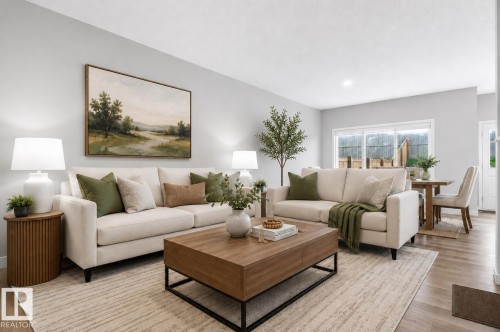 Open-concept living space featuring wood-finish flooring, recessed lighting, and expansive sliding glass doors - 22638 99A Avenue, Edmonton, AB 
