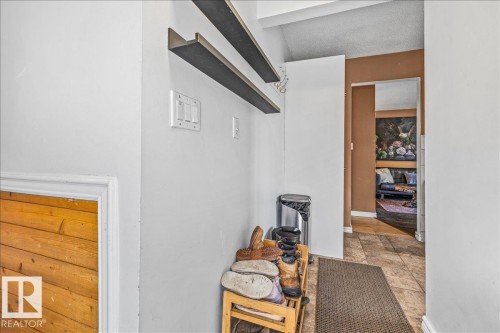 Entryway featuring white painted walls and tile flooring - 135 Homestead Crescent Nw, Edmonton, AB 