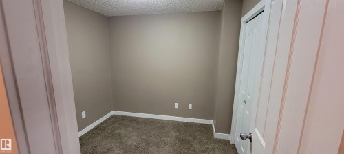 Den with closet & lockable door - 208 1080 Mcconachie Boulevard, Edmonton, AB 