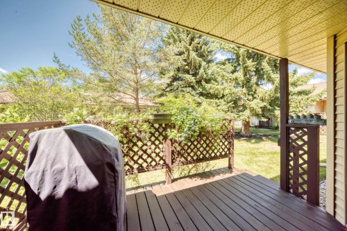 Exterior wooden deck with lattice privacy screening - 10822 11 Avenue, Edmonton, AB 