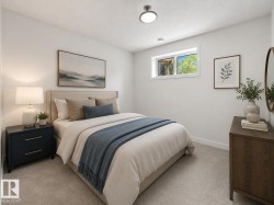 Bright room featuring a window, light-colored walls, and neutral carpeting - 