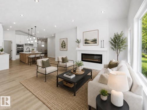 Open-concept living space featuring wood-finish flooring throughout, a modern electric fireplace with a white mantel, and large windows providing natural light - 3320 Chickadee Drive, Edmonton, AB 