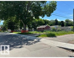Corner lot with mature trees and established sidewalks - 