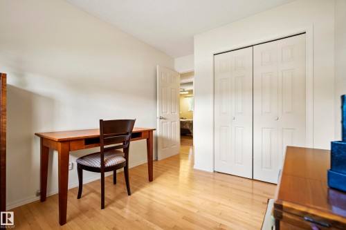 Light wood-finish flooring throughout - 3208 70 Street, Edmonton, AB 