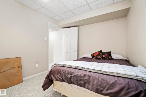 Carpeted room with light neutral wall tones - 3208 70 Street, Edmonton, AB 