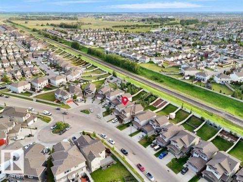 Aerial perspective showcasing a residential development with multiple detached homes - 3756 8 Street, Edmonton, AB 