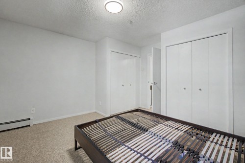Light neutral carpeting throughout - 11150 83 Avenue, Edmonton, AB 
