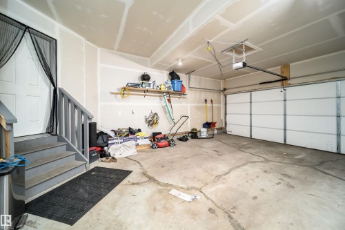 Attached one-car garage with overhead door and automatic opener - 16123 31 Avenue, Edmonton, AB 