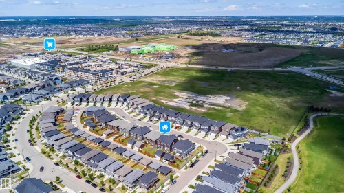 Aerial perspective of a developed residential area featuring a curvilinear street layout - 16123 31 Avenue, Edmonton, AB 