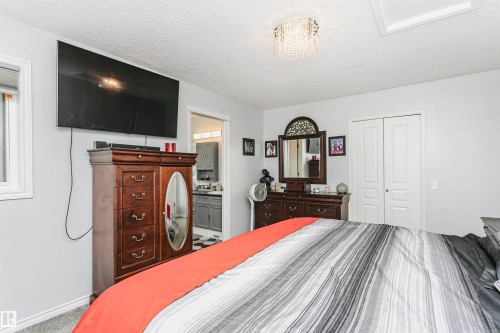 Recessed window with white trim, light gray wall paint, and carpet flooring - 4228 162 Avenue, Edmonton, AB 