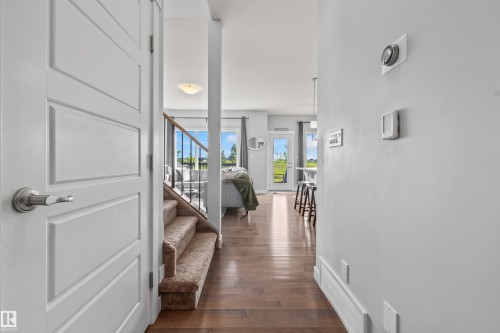 Hardwood-finish flooring throughout the main level - 607 40 Street, Edmonton, AB 