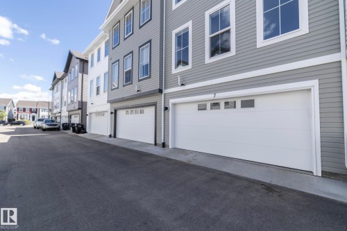Attached two-car garage with transom windows - 2610 Maple Way, Edmonton, AB 