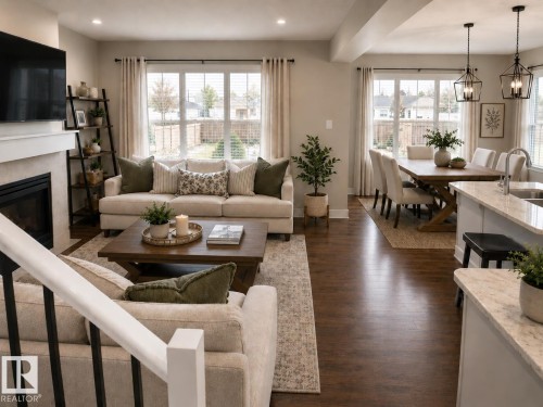 Open concept living area featuring wood-finish flooring, a fireplace with a mantel, and recessed lighting - 7274 Morgan Road, Edmonton, AB 