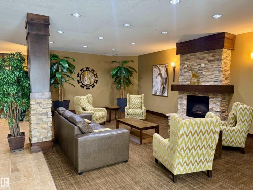 610 10303 111 Street, Edmonton, AB - Indoor With Fireplace