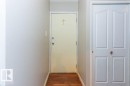 Entryway featuring wood-finish flooring - 6 3819 76 Street, Edmonton, AB 