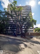 Mid-rise building featuring multiple levels of curved balconies - 