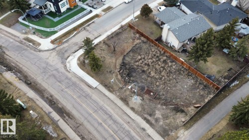 Expansive corner lot featuring direct road access and established fencing - 6004 19A Avenue Nw, Edmonton, AB 