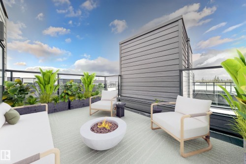 Rooftop terrace featuring modern slatted siding, glass panel railings, and integrated planters - #67 5 Rondeau Dr, St. Albert, AB - Outdoor With Exterior