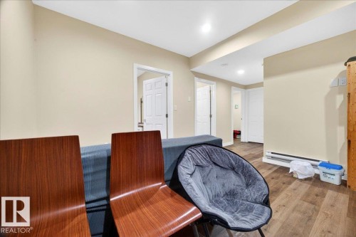 Bright interior space featuring light beige walls and recessed lighting - 1411 30 Avenue, Edmonton, AB 