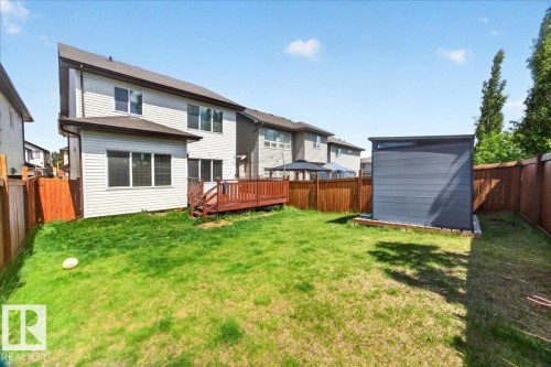 Expansive green lawn with a composite wood deck - 1411 30 Avenue, Edmonton, AB 