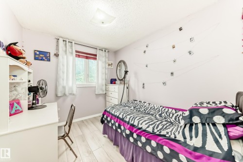 Room featuring light-toned wood-finish flooring - 3843 47 Street, Edmonton, AB 