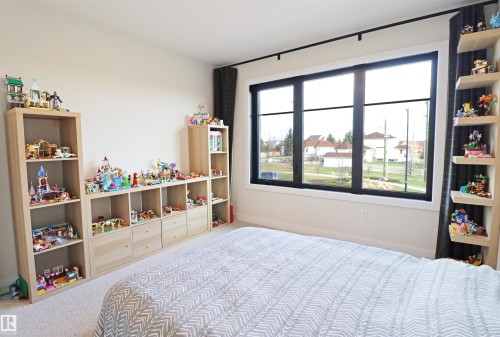 Bedroom 2 with a view of the adjacent green space - 100 Graybriar Drive, Stony Plain, AB - Indoor Photo Showing Bedroom