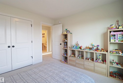 Bedroom 2 with a view of the adjacent green space - 100 Graybriar Drive, Stony Plain, AB - Indoor Photo Showing Bedroom