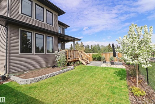 Professionally designed low maintenance backyard - 100 Graybriar Drive, Stony Plain, AB - Outdoor With Deck Patio Veranda