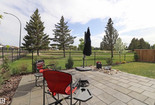 Professionally designed low maintenance backyard - 100 Graybriar Drive, Stony Plain, AB - Outdoor With Deck Patio Veranda