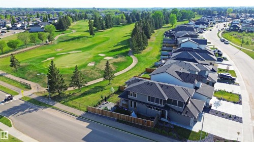 Residential community bordering a golf course with mature trees - 100 Graybriar Drive, Stony Plain, AB - Outdoor With View