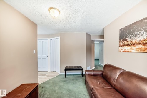Recessed lighting illuminates the textured ceiling - 9813 152 Street, Edmonton, AB 