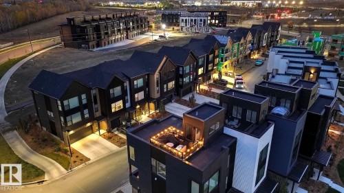Modern townhome community featuring varied architectural styles and exterior finishes - #66 5 Rondeau Dr, St. Albert, AB - Outdoor