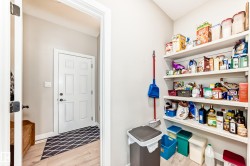 Dedicated pantry with extensive open shelving for organized storage - 