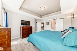 Recessed tray ceiling with central flush-mount light fixture - 