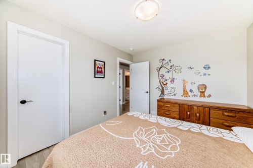 Interior room featuring light gray wall paint and white trim - 3895 Robins Crescent, Edmonton, AB 