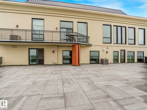 Expansive outdoor terrace featuring large format pavers - 902 10108 125 Street, Edmonton, AB 