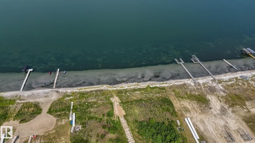 Waterfront property featuring multiple private docks and direct beach access - 104 60201 Rng Rd 122, Rural St. Paul County, AB 