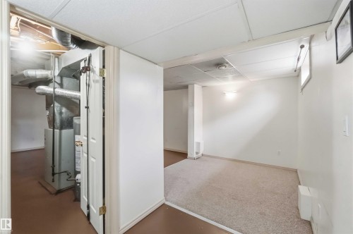 Utility area with exposed ductwork and mechanical systems - 17325 85 Avenue Nw, Edmonton, AB 