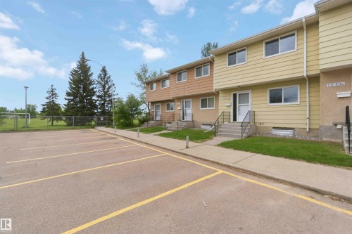 Townhouse-style property featuring a two-story design with siding exteriors - 17325 85 Avenue Nw, Edmonton, AB 