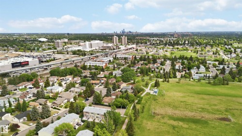 Aerial perspective showcasing a residential area with mature trees - 17325 85 Avenue Nw, Edmonton, AB 